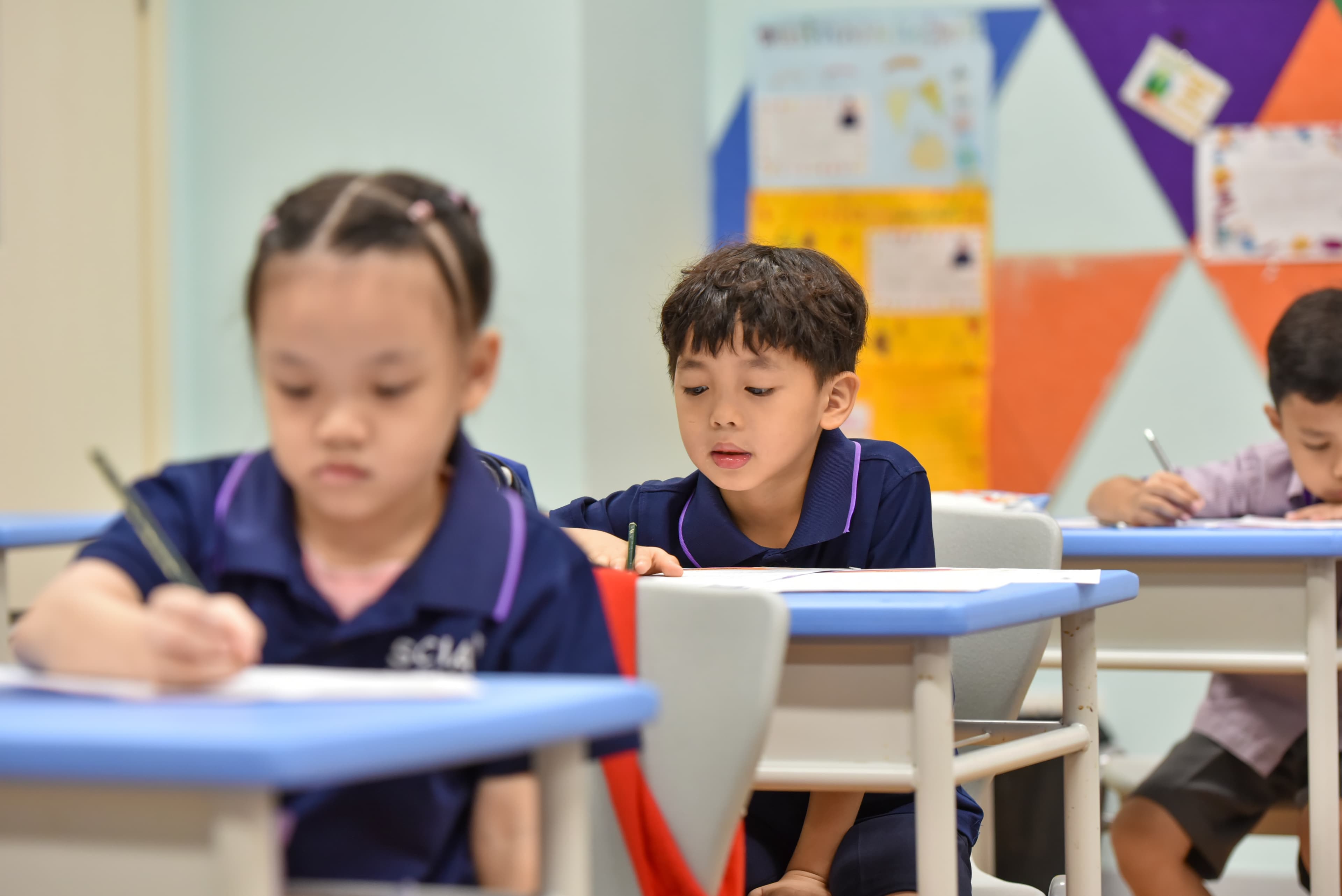 Young Smart Education students checking class results